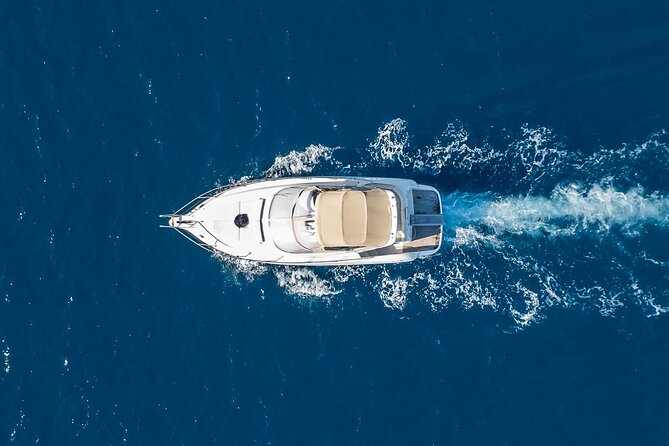 Private all included yacht Tour in Santorini - Oia sightseeing under the village and finishing at Ammoudi Bay