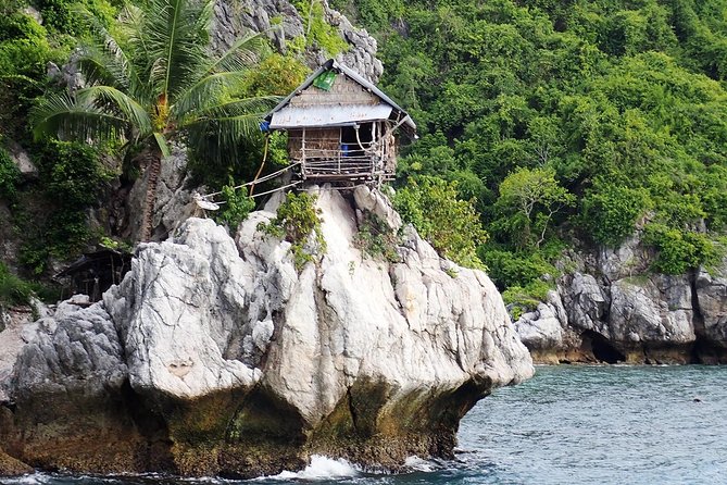Private Full-Day Blue Dragon Yacht for Snorkeling Koh Tan & Visit Pink Dolphin - Ko Chet Mun, Ko Mae Thap, and Ko Malaeng Pong: island views with local texture