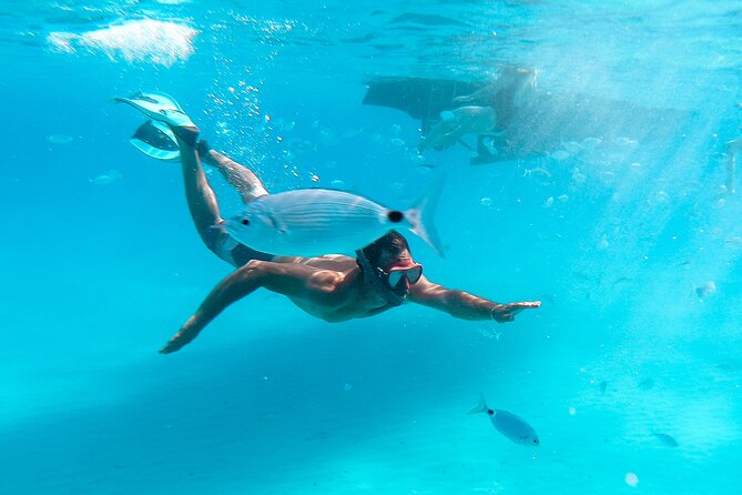 Private Full Day boat charter in Traditional Balearic Yacht - Snorkeling, Paddleboards, and the Water-Play Mix