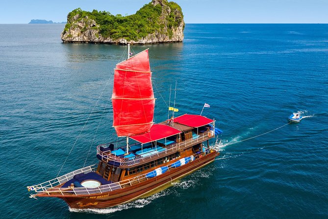 Private Full-Day Red Dragon Yacht for Snorkeling Koh Tan & Visit Pink Dolphin - A teak-wood yacht day that feels tailored, not canned