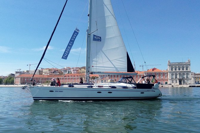Private Lisbon Sailing Cruise on Sailing Yacht - The halfway stop: Portuguese drinks and appetizers on deck