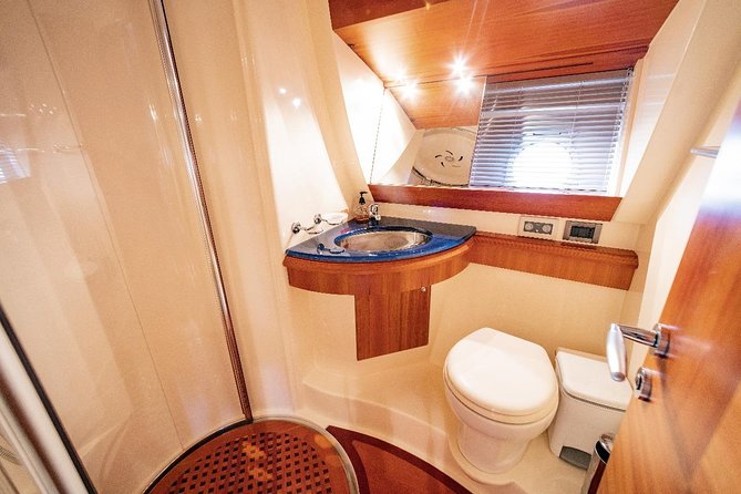 Private Luxury Yacht Cruise for up to 20 people - Onboard Comfort That Actually Helps: Water, Restroom, AC, and Music
