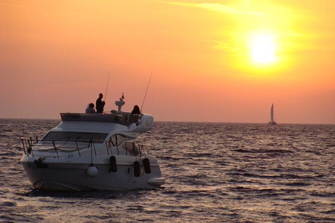 Private Motor Yacht Cruise with BBQ, Open Bar & Transfers - Ammoudi Bay, Saint Nicolas chapel, and the sunset option