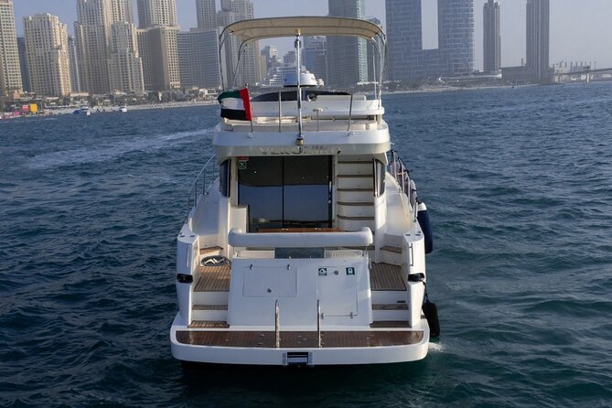 Private Yacht Cruising Rental from Dubai Marina - The 55-foot yacht experience: deck time, salon comfort, and stereo sounds