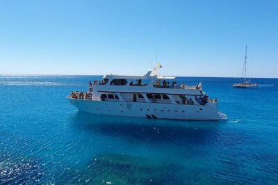 Protaras: St Georgios Presidential Cruise BBQ & 1 drink. 16+ - Seeing Cape Greco Sea Caves and Pirate-Used Routes