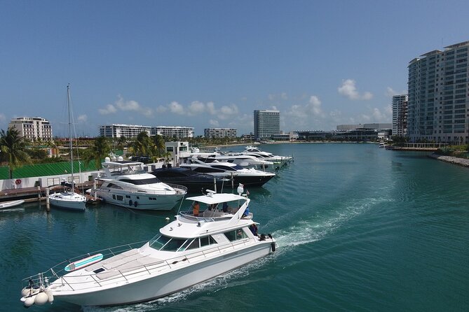 Rent a Private Yacht or Boat for 4 hrs from Playa Mujeres -SR55H4 - What’s Included: Snacks, Drinks, and Snorkeling Gear