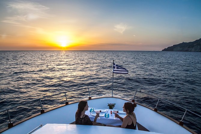 Santorini: Motor Yacht Private Cruise with 5-Course Meal - Red Beach stop: iconic color, short window, great views from the water