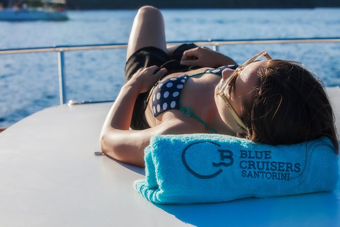Santorini: Motor Yacht Sunset Cruise with 5-Course Dinner - Mesa Pigadia Beach for 2 hours: the best long swim window on the route