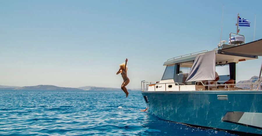 Santorini: Private Diamond 36 Motor Yacht Caldera Cruise - White Beach and Red Beach: quick photo hits vs real swim time