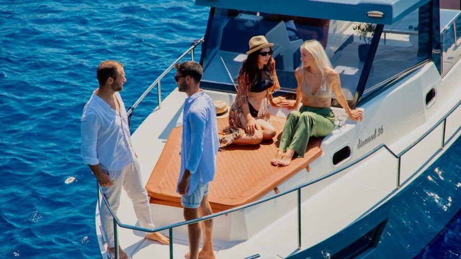 Santorini: Private Diamond 36 Motor Yacht Caldera Cruise - Indian Rock, Venetian Lighthouse, and the “stop for photos” rhythm