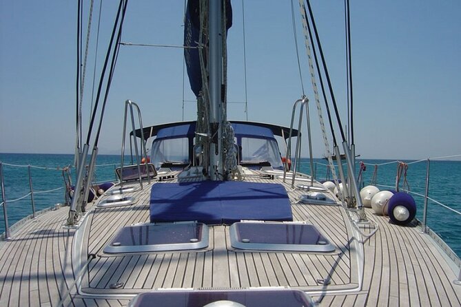 Santorini: Private Sailing Yacht Cruise with Meal and Drinks - Mesa Pigadia’s black-sand swim on Santorini’s south side