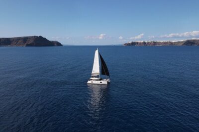 Santorini Private Tour Half-Day Sailing Platinum Catamaran Cruise - Getting there: Vlichada meeting point and optional private minivan pickup