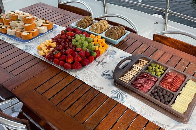 Shared Yacht Tour in Dubai Marina - Onboard Comfort: Water, Life Vests, Snacks or Meals, and Music