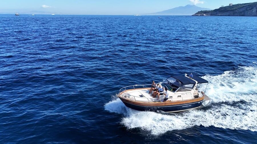 Sorrento: Capri and Blue Grotto Yacht Tour with Snorkeling - The cave route: Blue Grotto, White Grotta, Green Grotto, and the Natural Arch