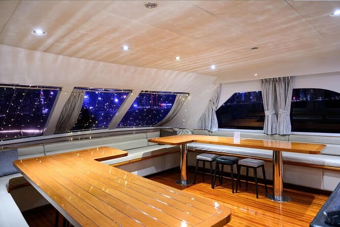 STARLIGHT: Victoria Harbour Night Yacht Tour - Onboard comfort: air-conditioning, restroom, and photo-friendly crew