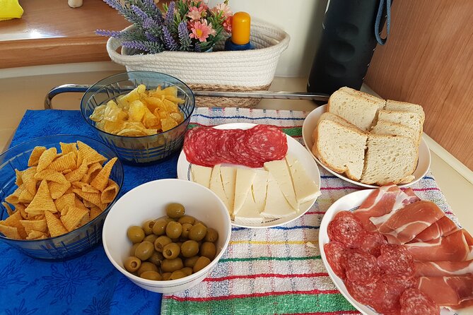 Sunset yacht ride in Barcelona + snacks and drinks - Group Size, Language, and How It Feels Onboard