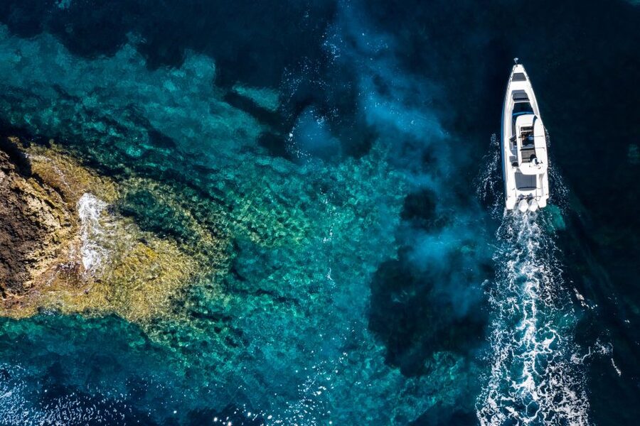 The Fastest All Inclusive Private Motor Yacht in Santorini - The Santorini caldera views: villages like a distant mountain range