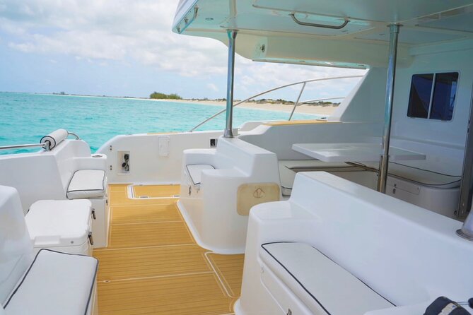 Turks and Caicos Full-Day Luxury Private Yacht Charter - Secluded beach time: anchored shore, explore or just float