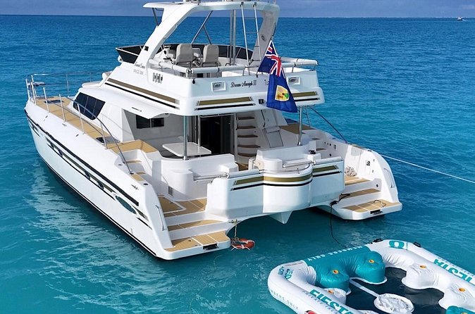 Turks and Caicos Full-Day Luxury Private Yacht Charter - Open bar: unlimited drinks, but smart pacing keeps it fun