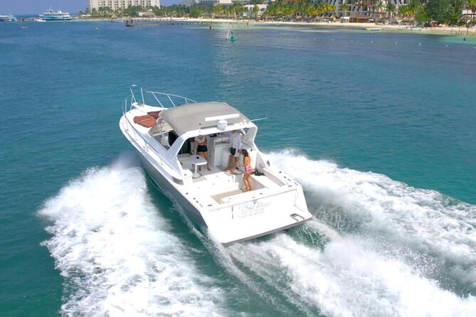 Yacht experience in Cancun: cruise, swim and sunset views - Isla Mujeres time: snorkeling, Playa Norte, and walking or shopping