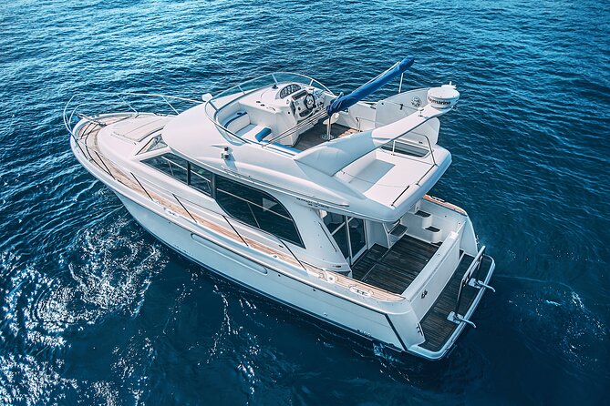 Yacht Meridian 40FT Best Private Rental in Cancun - Isla Mujeres day plan: mangroves, shipwreck snorkeling, and Playa Norte
