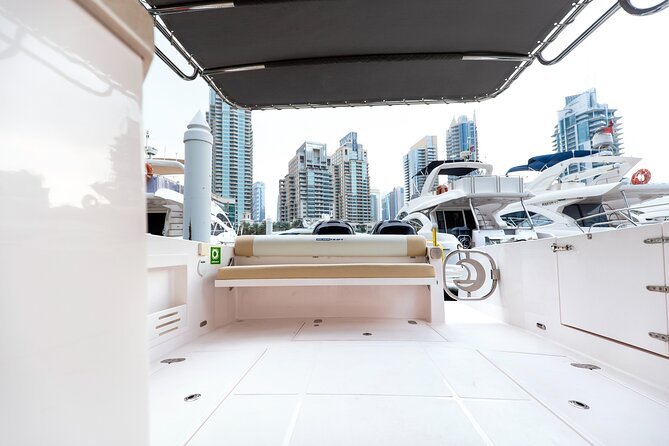 Yachting in Dubai: Book 36 ft Yacht Charter up to 10 people - Bluewater’s Island and the Tall Wheel Moment